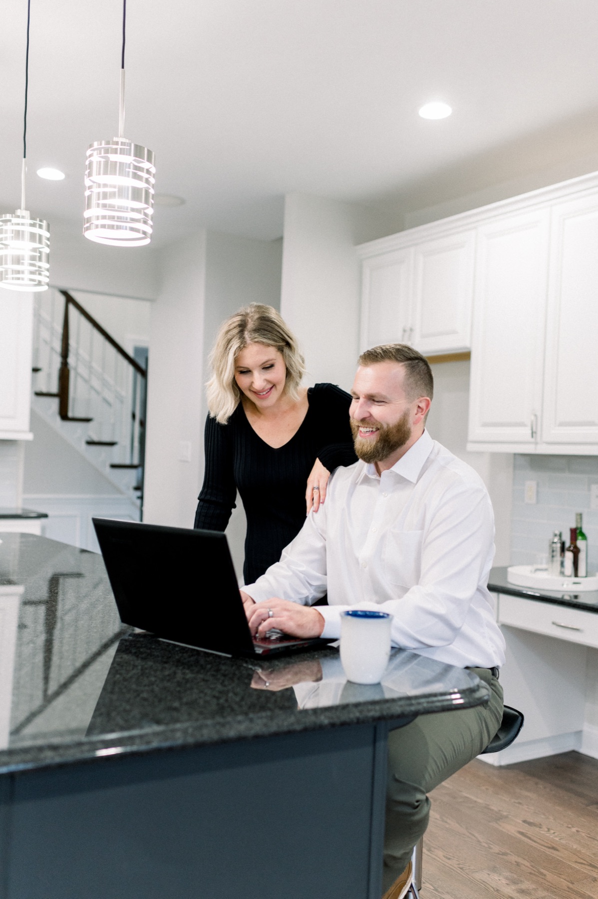 Ariella and Lukasz working together on a client transaction